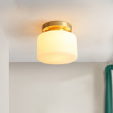 Minimalist Cylindrical Semi Flush Mount Lamp 1 Head Cream Glass Ceiling Light in Brass for Foyer Clearhalo 'Ceiling Lights' 'Close To Ceiling Lights' 'Close to ceiling' 'Semi-flushmount' Lighting' 2323383