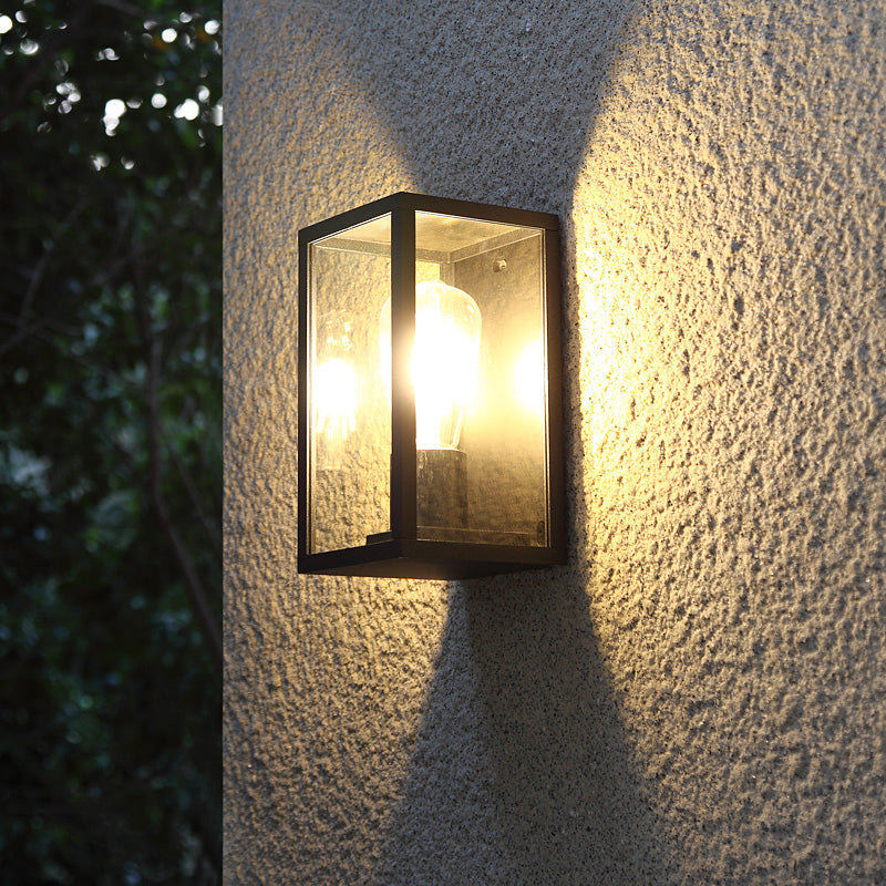 Box Patio Wall Lighting Fixture Transparent Glass 1 Bulb Modern Wall Sconce in Black Clearhalo 'Cast Iron' 'Glass' 'Industrial' 'Modern wall lights' 'Modern' 'Tiffany' 'Traditional wall lights' 'Wall Lamps & Sconces' 'Wall Lights' Lighting' 2336800