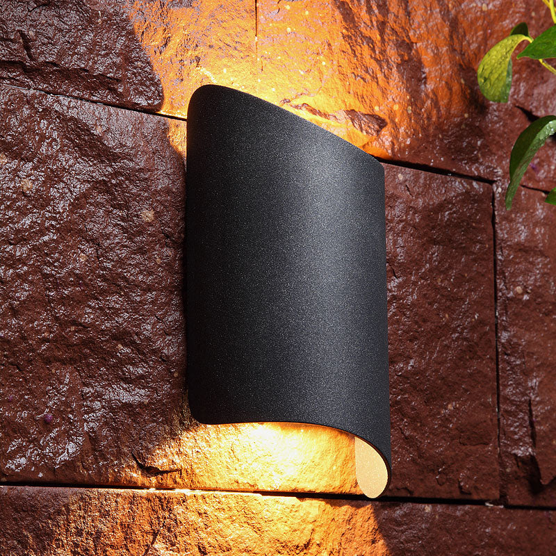 Minimalistic LED Up Down Light Black Curved Wall Sconce Lamp with Metal Shade for Yard Clearhalo 'Cast Iron' 'Glass' 'Industrial' 'Modern wall lights' 'Modern' 'Tiffany' 'Traditional wall lights' 'Wall Lamps & Sconces' 'Wall Lights' Lighting' 2336961
