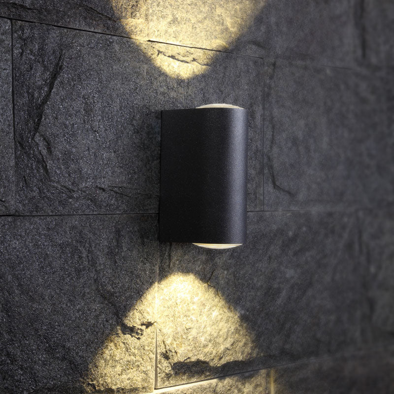 Tube Shaped Outdoor Wall Light Fixture Metallic Minimalism LED Sconce Lamp in Black Black Clearhalo 'Cast Iron' 'Glass' 'Industrial' 'Modern wall lights' 'Modern' 'Tiffany' 'Traditional wall lights' 'Wall Lamps & Sconces' 'Wall Lights' Lighting' 2336974