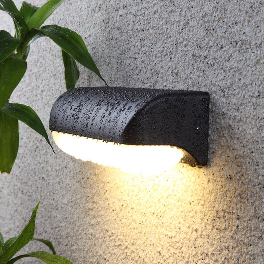 Capsule Shaped Acrylic LED Wall Light Minimalism Black Finish Wall Sconce for Yard Black Circular Arc Clearhalo 'Cast Iron' 'Glass' 'Industrial' 'Modern wall lights' 'Modern' 'Tiffany' 'Traditional wall lights' 'Wall Lamps & Sconces' 'Wall Lights' Lighting' 2336997