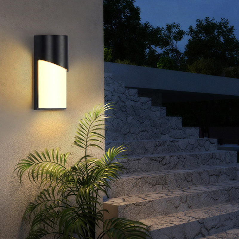 Cylindrical Outdoor Flush Mount Wall Sconce Metallic Modernist LED Wall Light in Black Clearhalo 'Cast Iron' 'Glass' 'Industrial' 'Modern wall lights' 'Modern' 'Tiffany' 'Traditional wall lights' 'Wall Lamps & Sconces' 'Wall Lights' Lighting' 2353319