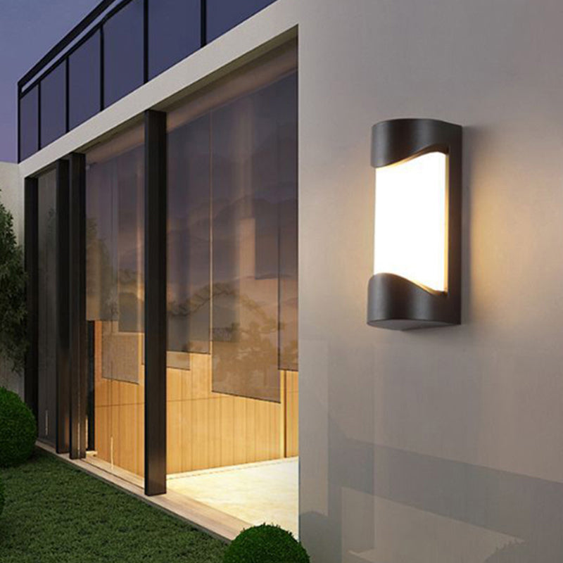 Cylindrical Outdoor Flush Mount Wall Sconce Metallic Modernist LED Wall Light in Black Black Circular Arc Clearhalo 'Cast Iron' 'Glass' 'Industrial' 'Modern wall lights' 'Modern' 'Tiffany' 'Traditional wall lights' 'Wall Lamps & Sconces' 'Wall Lights' Lighting' 2353324