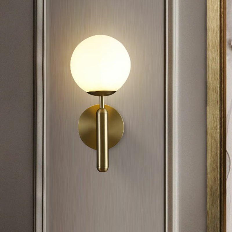 Glass Ball Shaped Wall Mount Light Postmodern 1 Head Brass Finish Sconce Lamp for Living Room Clearhalo 'Cast Iron' 'Glass' 'Industrial' 'Modern wall lights' 'Modern' 'Tiffany' 'Traditional wall lights' 'Wall Lamps & Sconces' 'Wall Lights' Lighting' 2353425
