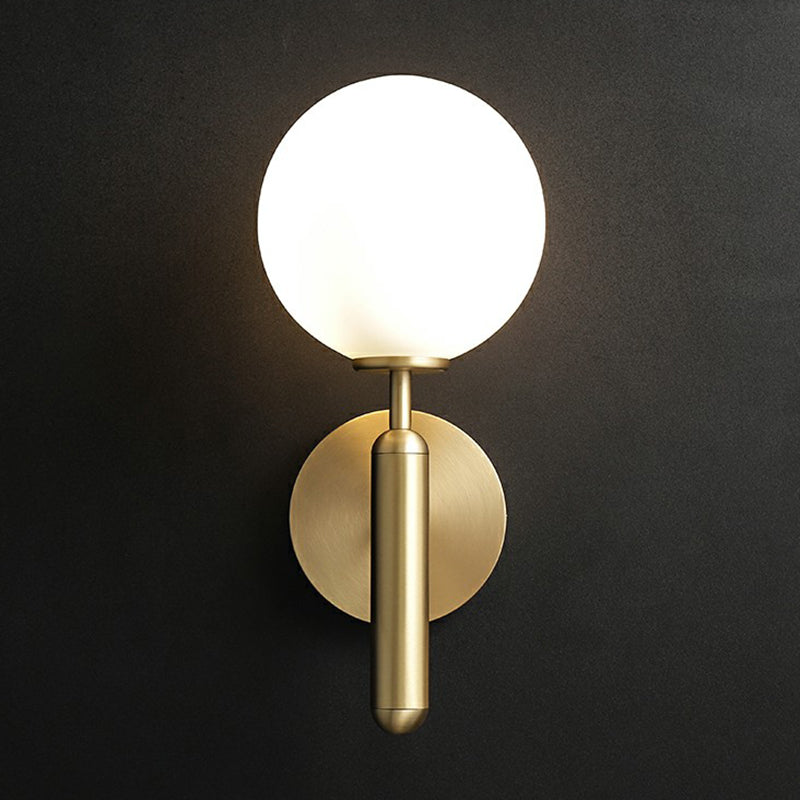 Glass Ball Shaped Wall Mount Light Postmodern 1 Head Brass Finish Sconce Lamp for Living Room Clearhalo 'Cast Iron' 'Glass' 'Industrial' 'Modern wall lights' 'Modern' 'Tiffany' 'Traditional wall lights' 'Wall Lamps & Sconces' 'Wall Lights' Lighting' 2353427