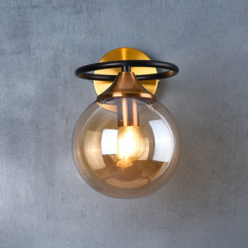 Postmodern Style Ball Wall Light Fixture Glass 1-Light Bedroom Wall Sconce Light in Brass Clearhalo 'Cast Iron' 'Glass' 'Industrial' 'Modern wall lights' 'Modern' 'Tiffany' 'Traditional wall lights' 'Wall Lamps & Sconces' 'Wall Lights' Lighting' 2353444
