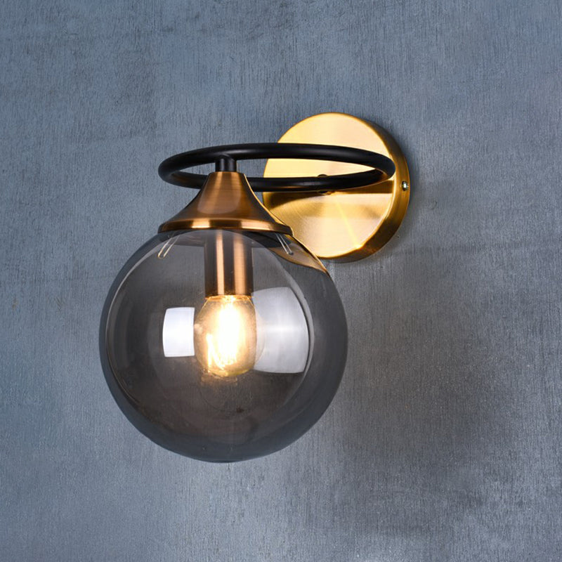 Postmodern Style Ball Wall Light Fixture Glass 1-Light Bedroom Wall Sconce Light in Brass Clearhalo 'Cast Iron' 'Glass' 'Industrial' 'Modern wall lights' 'Modern' 'Tiffany' 'Traditional wall lights' 'Wall Lamps & Sconces' 'Wall Lights' Lighting' 2353446