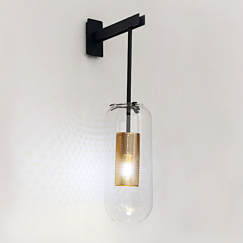 Pill Capsule Clear Glass Wall Sconce Postmodern 1-Light Wall Hanging Light with Mesh Cage Clearhalo 'Cast Iron' 'Glass' 'Industrial' 'Modern wall lights' 'Modern' 'Tiffany' 'Traditional wall lights' 'Wall Lamps & Sconces' 'Wall Lights' Lighting' 2353472