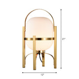 Capsule Glass Night Lamp Postmodern 1-Light Brass Finish Table Light with Quadpod and Arched Handle Clearhalo 'Lamps' 'Table Lamps' Lighting' 2353532