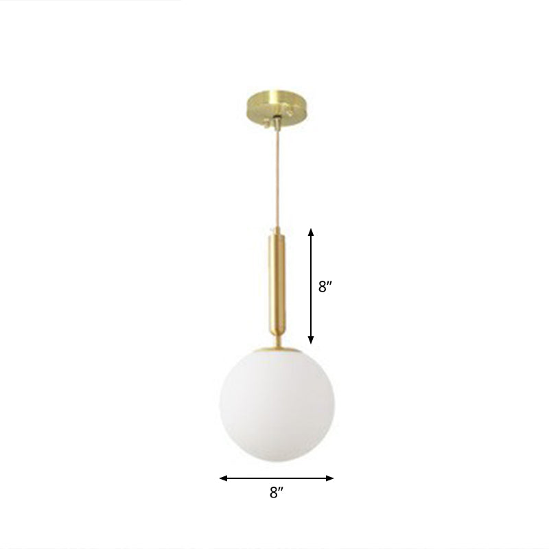 Ball Dining Room Pendulum Light White Glass 1-Head Simple Pendant Lighting in Brass Brass 8" Clearhalo 'Ceiling Lights' 'Modern Pendants' 'Modern' 'Pendant Lights' 'Pendants' Lighting' 2353836