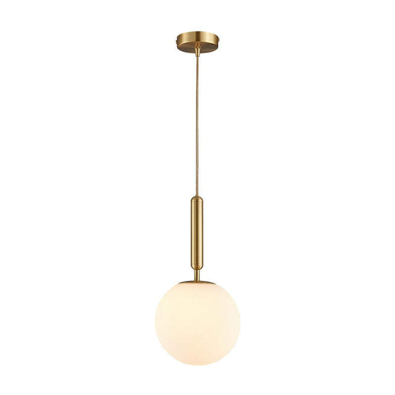 Ball Dining Room Pendulum Light White Glass 1-Head Simple Pendant Lighting in Brass Clearhalo 'Ceiling Lights' 'Modern Pendants' 'Modern' 'Pendant Lights' 'Pendants' Lighting' 2353839