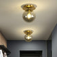 Ball Foyer Semi Flush Mount Lighting Glass 1-Light Postmodern Ceiling Light in Brass Clearhalo 'Ceiling Lights' 'Close To Ceiling Lights' 'Close to ceiling' 'Semi-flushmount' Lighting' 2353947
