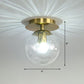 Ball Foyer Semi Flush Mount Lighting Glass 1-Light Postmodern Ceiling Light in Brass Clear Clearhalo 'Ceiling Lights' 'Close To Ceiling Lights' 'Close to ceiling' 'Semi-flushmount' Lighting' 2353948