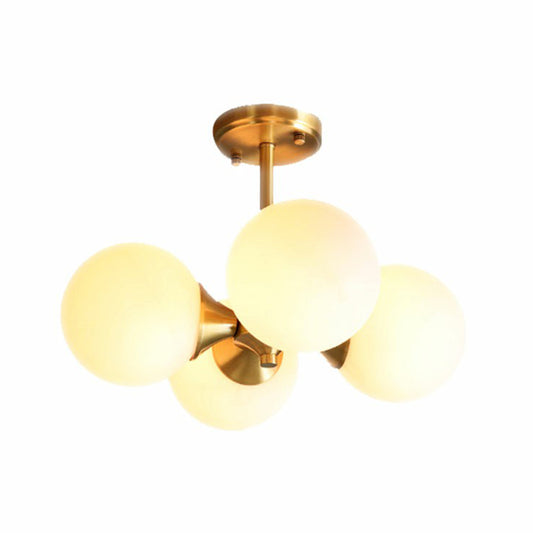 Brass Globe Flush Mount Lighting Postmodern 4 Heads Opal Glass Semi Flush Light for Bedroom Clearhalo 'Ceiling Lights' 'Chandeliers' 'Modern Chandeliers' 'Modern' Lighting' 2354237