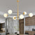 Brass Tiered Hanging Pendant Light Postmodern Metal Chandelier with Ball Milky Glass Shade 6 Brass Clearhalo 'Ceiling Lights' 'Chandeliers' 'Modern Chandeliers' 'Modern' Lighting' 2354299