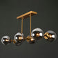 Brass Linear Island Light Fixture Postmodern Metal Ceiling Light with Globe Glass Shade Clearhalo 'Ceiling Lights' 'Island Lights' Lighting' 2354396