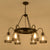 6/8 Heads Bell Hanging Lamp with Cage Style Frame Farmhouse Black Metal Chandelier Light Fixture 6 Black Clearhalo 'Cast Iron' 'Ceiling Lights' 'Chandeliers' 'Industrial Chandeliers' 'Industrial' 'Metal' 'Middle Century Chandeliers' 'Rustic Chandeliers' 'Tiffany' Lighting' 235621