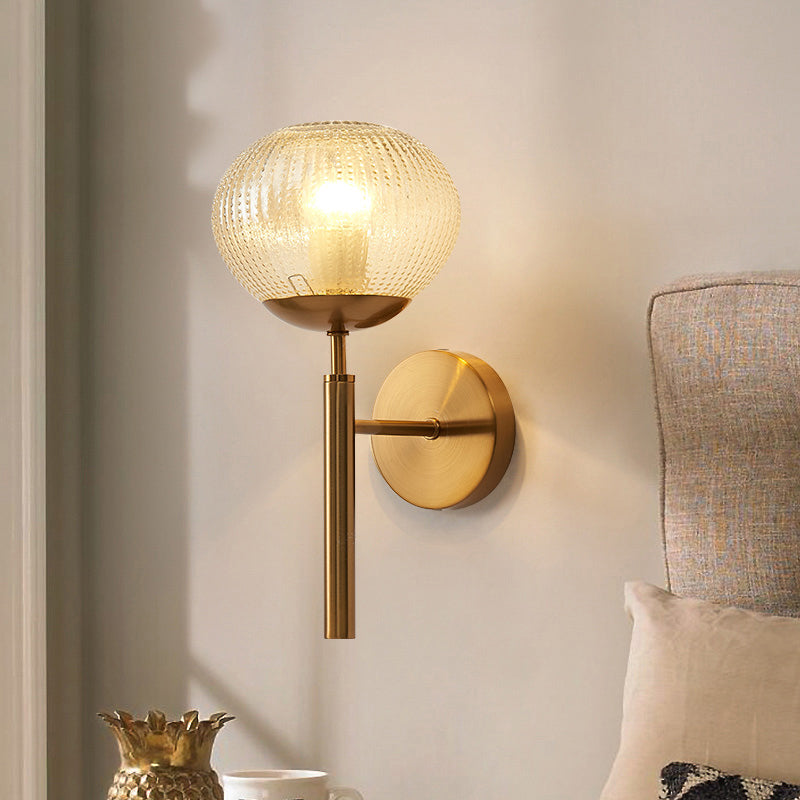 Postmodern Ball Shaped Sconce Lamp Textured Glass 1-Bulb Bedside Wall Light in Brass Clearhalo 'Cast Iron' 'Glass' 'Industrial' 'Modern wall lights' 'Modern' 'Tiffany' 'Traditional wall lights' 'Wall Lamps & Sconces' 'Wall Lights' Lighting' 2356714