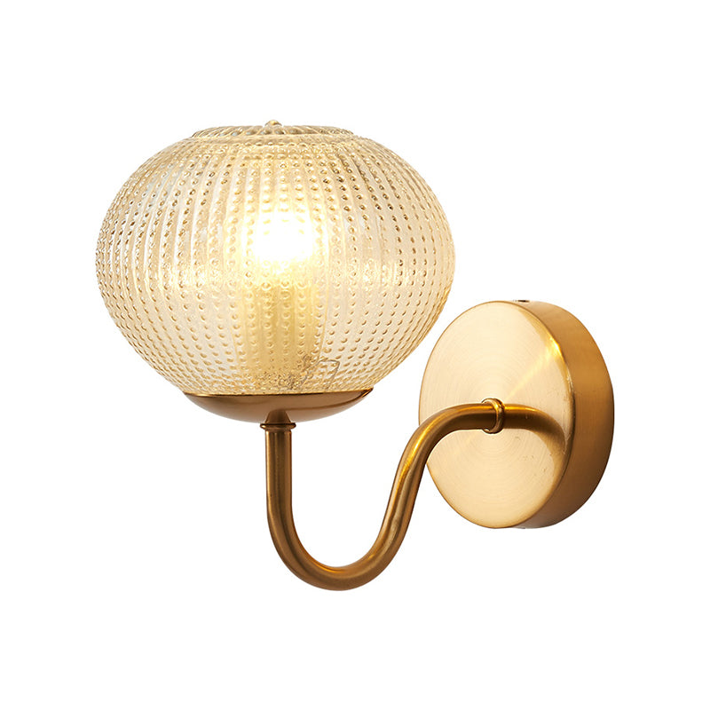 Postmodern Ball Shaped Sconce Lamp Textured Glass 1-Bulb Bedside Wall Light in Brass Clearhalo 'Cast Iron' 'Glass' 'Industrial' 'Modern wall lights' 'Modern' 'Tiffany' 'Traditional wall lights' 'Wall Lamps & Sconces' 'Wall Lights' Lighting' 2356716