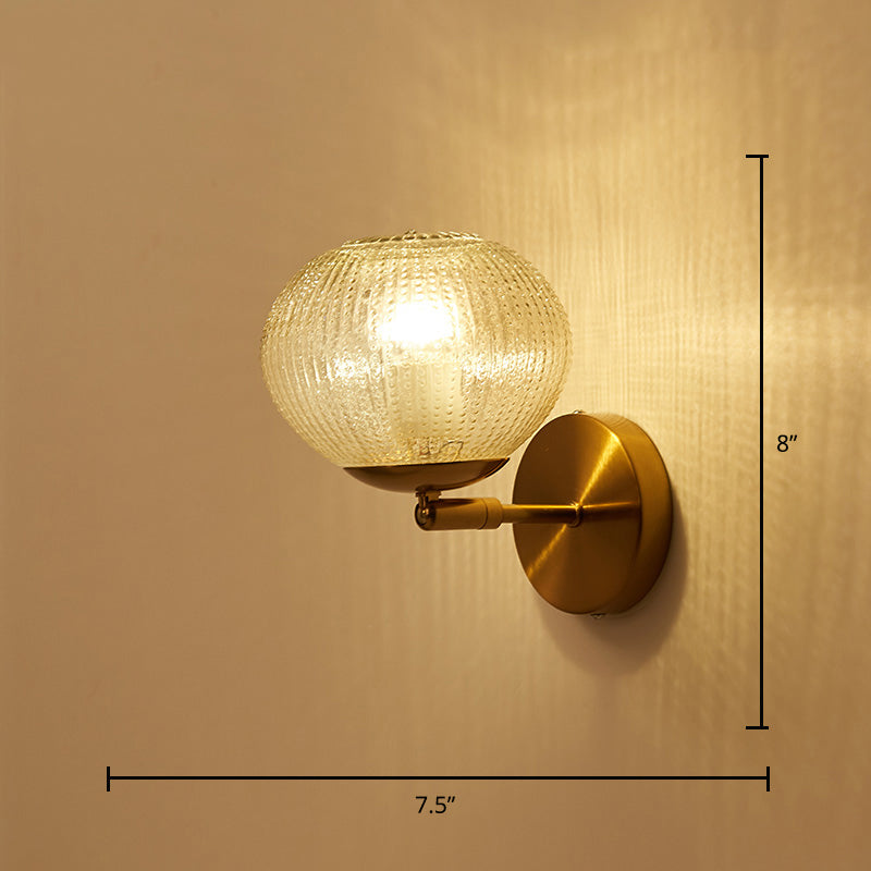 Postmodern Ball Shaped Sconce Lamp Textured Glass 1-Bulb Bedside Wall Light in Brass Brass Tapered Right Angle Clearhalo 'Cast Iron' 'Glass' 'Industrial' 'Modern wall lights' 'Modern' 'Tiffany' 'Traditional wall lights' 'Wall Lamps & Sconces' 'Wall Lights' Lighting' 2356721