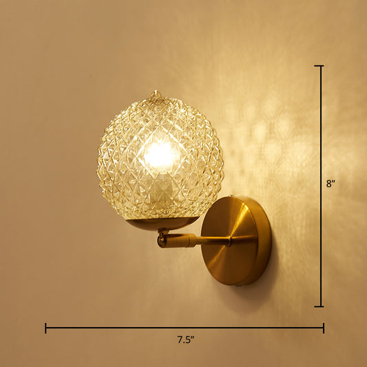 Postmodern Ball Shaped Sconce Lamp Textured Glass 1-Bulb Bedside Wall Light in Brass Brass Globe Right Angle Clearhalo 'Cast Iron' 'Glass' 'Industrial' 'Modern wall lights' 'Modern' 'Tiffany' 'Traditional wall lights' 'Wall Lamps & Sconces' 'Wall Lights' Lighting' 2356722