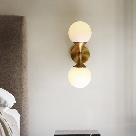 Simple Style Ball Wall Lamp Ivory Glass 2-Head Bedroom Wall Sconce Light in Brass Brass Clearhalo 'Cast Iron' 'Glass' 'Industrial' 'Modern wall lights' 'Modern' 'Tiffany' 'Traditional wall lights' 'Wall Lamps & Sconces' 'Wall Lights' Lighting' 2356744