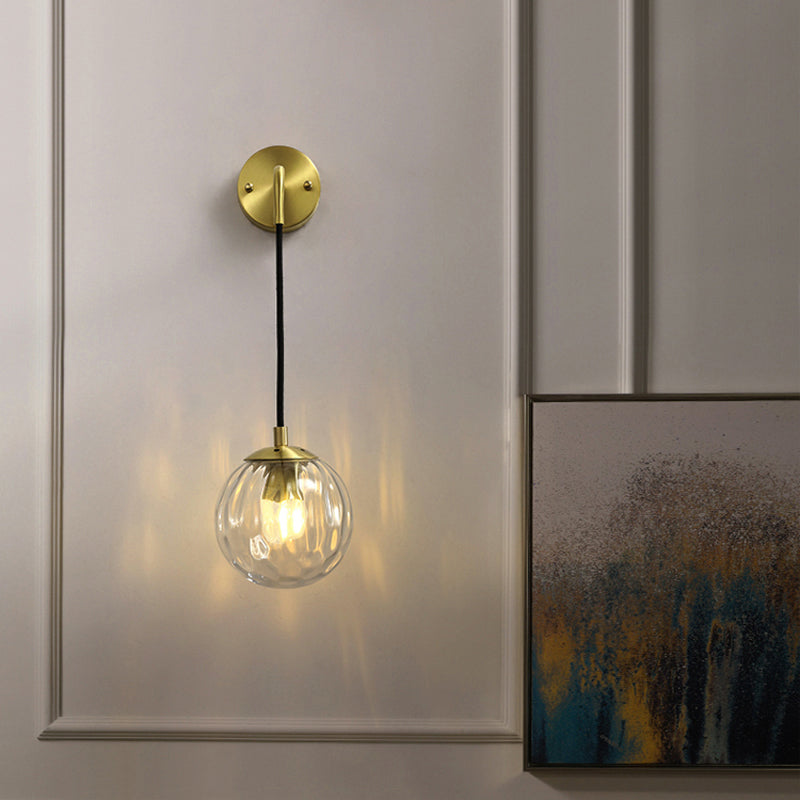 Clear Ripple Glass Ball Wall Light Minimalistic 1-Light Brass Sconce Fixture for Dining Room Clearhalo 'Cast Iron' 'Glass' 'Industrial' 'Modern wall lights' 'Modern' 'Tiffany' 'Traditional wall lights' 'Wall Lamps & Sconces' 'Wall Lights' Lighting' 2356780