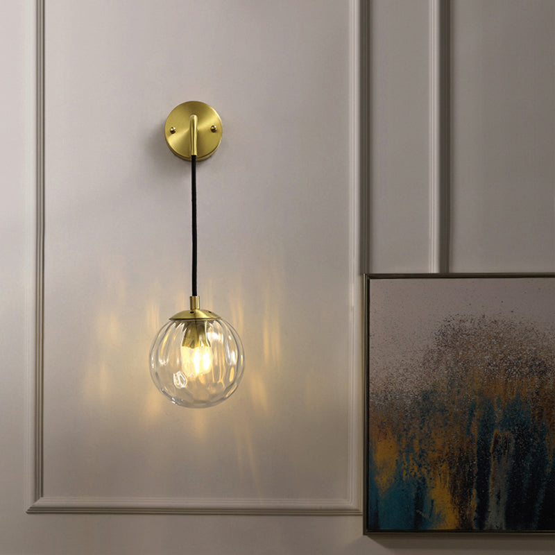 Clear Ripple Glass Ball Wall Light Minimalistic 1-Light Brass Sconce Fixture for Dining Room Clearhalo 'Cast Iron' 'Glass' 'Industrial' 'Modern wall lights' 'Modern' 'Tiffany' 'Traditional wall lights' 'Wall Lamps & Sconces' 'Wall Lights' Lighting' 2356780