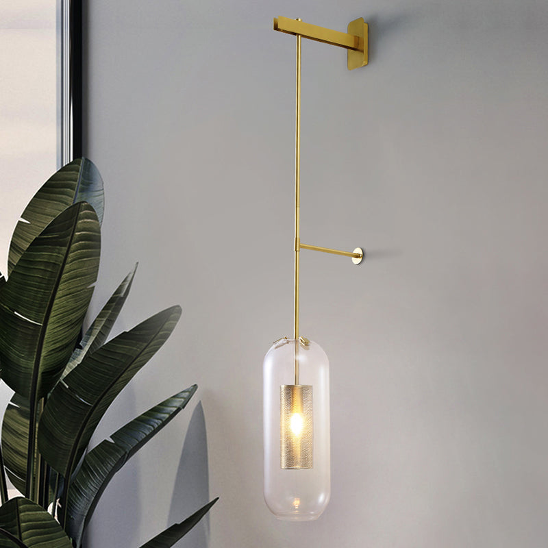 Pill Capsule Glass Wall Lamp Post-Modern 1 Head Brass Sconce Light Fixture with Mesh Guard Clearhalo 'Cast Iron' 'Glass' 'Industrial' 'Modern wall lights' 'Modern' 'Tiffany' 'Traditional wall lights' 'Wall Lamps & Sconces' 'Wall Lights' Lighting' 2356794