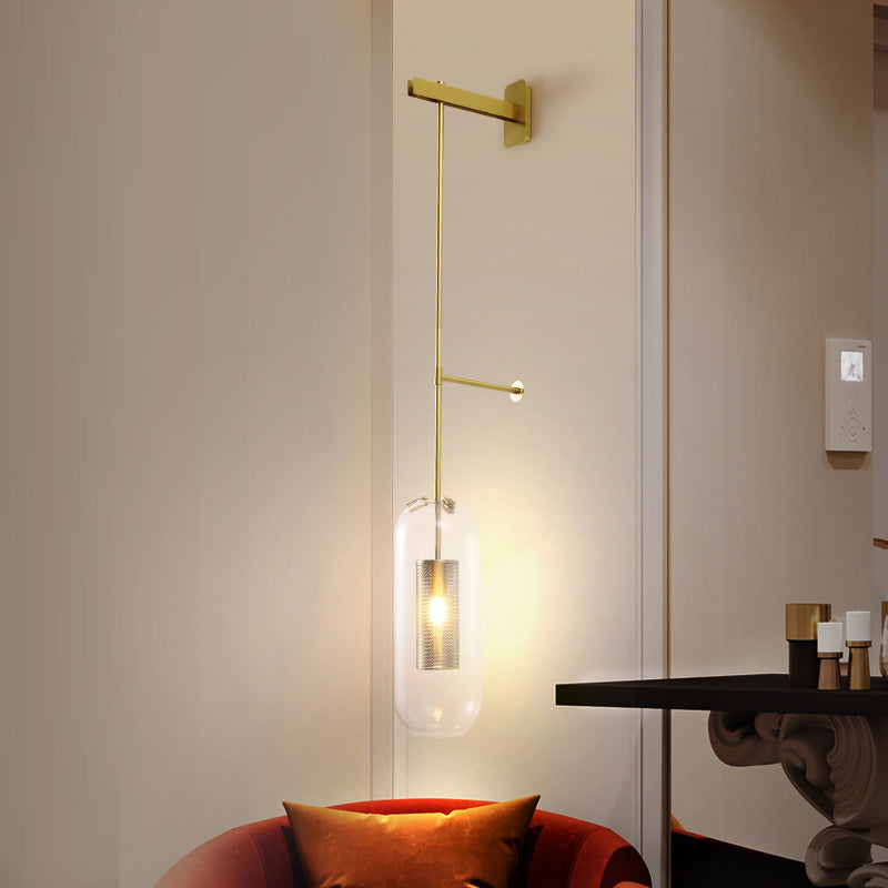 Pill Capsule Glass Wall Lamp Post-Modern 1 Head Brass Sconce Light Fixture with Mesh Guard Clearhalo 'Cast Iron' 'Glass' 'Industrial' 'Modern wall lights' 'Modern' 'Tiffany' 'Traditional wall lights' 'Wall Lamps & Sconces' 'Wall Lights' Lighting' 2356797
