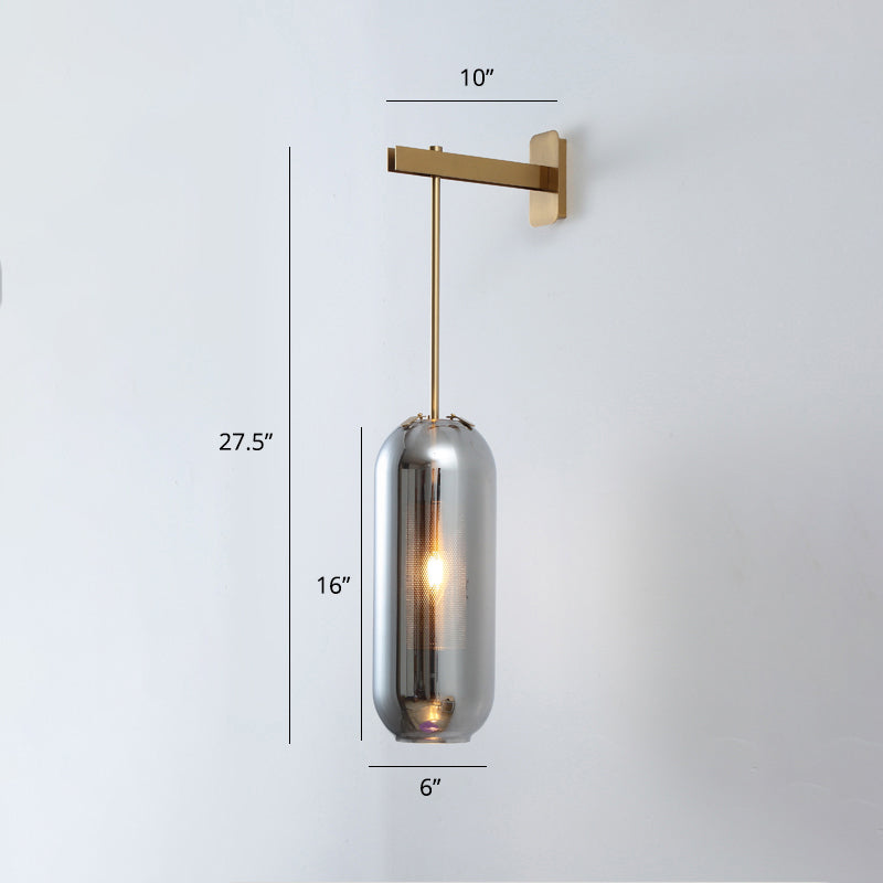 Pill Capsule Glass Wall Lamp Post-Modern 1 Head Brass Sconce Light Fixture with Mesh Guard Smoke Gray Short Arm Clearhalo 'Cast Iron' 'Glass' 'Industrial' 'Modern wall lights' 'Modern' 'Tiffany' 'Traditional wall lights' 'Wall Lamps & Sconces' 'Wall Lights' Lighting' 2356803
