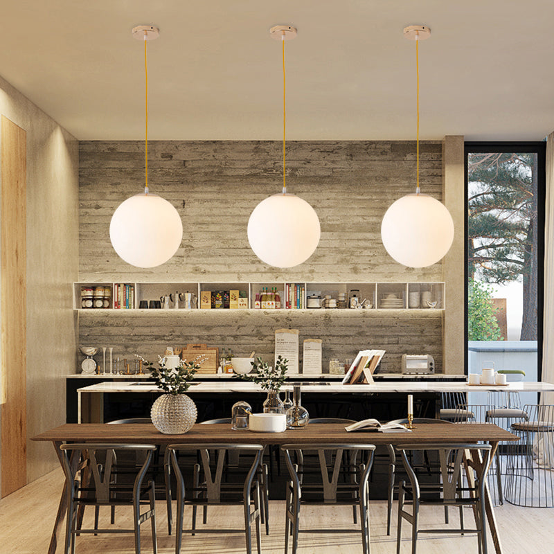 Globe Milky Glass Hanging Lamp Minimalistic 1-Light Gold Pendant Light for Dining Room Clearhalo 'Ceiling Lights' 'Modern Pendants' 'Modern' 'Pendant Lights' 'Pendants' Lighting' 2356906