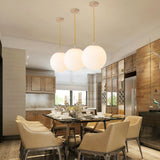 Globe Milky Glass Hanging Lamp Minimalistic 1-Light Gold Pendant Light for Dining Room Clearhalo 'Ceiling Lights' 'Modern Pendants' 'Modern' 'Pendant Lights' 'Pendants' Lighting' 2356907