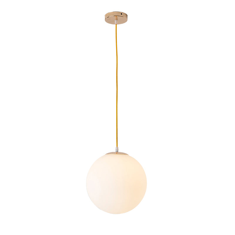 Globe Milky Glass Hanging Lamp Minimalistic 1-Light Gold Pendant Light for Dining Room Clearhalo 'Ceiling Lights' 'Modern Pendants' 'Modern' 'Pendant Lights' 'Pendants' Lighting' 2356908