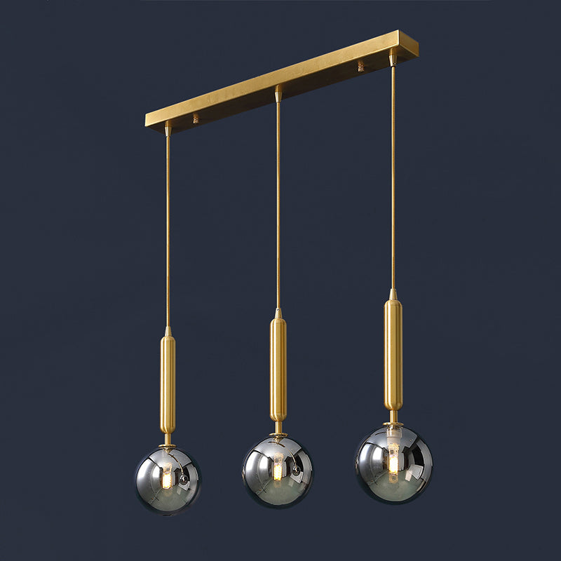 3 Lights Dining Room Multi Ceiling Light Postmodern Brass Pendant with Ball Glass Shade Smoke Gray 21.5" Clearhalo 'Ceiling Lights' 'Modern Pendants' 'Modern' 'Pendant Lights' 'Pendants' Lighting' 2357033