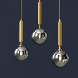 3 Lights Dining Room Multi Ceiling Light Postmodern Brass Pendant with Ball Glass Shade Smoke Gray 12" Clearhalo 'Ceiling Lights' 'Modern Pendants' 'Modern' 'Pendant Lights' 'Pendants' Lighting' 2357034