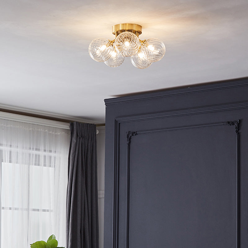 Post-Modern Ball Semi Mount Lighting Clear Twist Glass Dining Room Flush Ceiling Light in Brass Clearhalo 'Ceiling Lights' 'Close To Ceiling Lights' 'Close to ceiling' 'Semi-flushmount' Lighting' 2357077