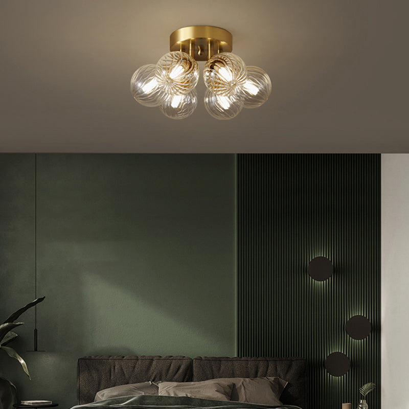 Post-Modern Ball Semi Mount Lighting Clear Twist Glass Dining Room Flush Ceiling Light in Brass Clearhalo 'Ceiling Lights' 'Close To Ceiling Lights' 'Close to ceiling' 'Semi-flushmount' Lighting' 2357082