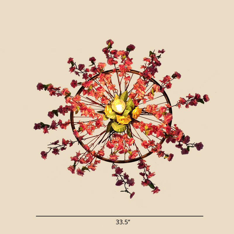 Single Wagon Wheel Wall Lamp Industrial Metal Wall Mounted Light with Artificial Plant Deco Pink Clearhalo 'Art deco wall lights' 'Cast Iron' 'Glass' 'Industrial wall lights' 'Industrial' 'Middle century wall lights' 'Modern' 'Rustic wall lights' 'Tiffany' 'Traditional wall lights' 'Wall Lamps & Sconces' 'Wall Lights' Lighting' 2364571