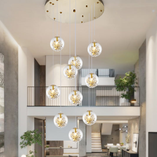 Minimalist Sphere Multi Light Chandelier Clear Glass 10-Head Stairs Pendant Lamp with Metal Flower Decor in Gold Clearhalo 'Ceiling Lights' 'Close To Ceiling Lights' 'Glass shade' 'Glass' 'Modern Pendants' 'Modern' 'Pendant Lights' 'Pendants' Lighting' 2384719