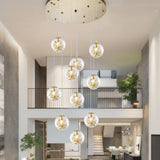 Minimalist Sphere Multi Light Chandelier Clear Glass 10-Head Stairs Pendant Lamp with Metal Flower Decor in Gold Clearhalo 'Ceiling Lights' 'Close To Ceiling Lights' 'Glass shade' 'Glass' 'Modern Pendants' 'Modern' 'Pendant Lights' 'Pendants' Lighting' 2384719