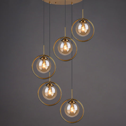 Brass Finish Cluster Ball Pendant Post-Modern 5 Bulbs Glass Suspended Lighting Fixture Amber Circline Clearhalo 'Ceiling Lights' 'Modern Pendants' 'Modern' 'Pendant Lights' 'Pendants' Lighting' 2384746
