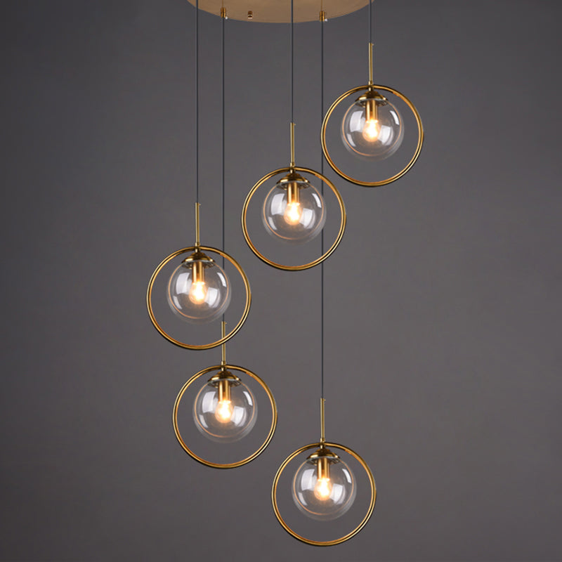 Brass Finish Cluster Ball Pendant Post-Modern 5 Bulbs Glass Suspended Lighting Fixture Clear Circline Clearhalo 'Ceiling Lights' 'Modern Pendants' 'Modern' 'Pendant Lights' 'Pendants' Lighting' 2384748