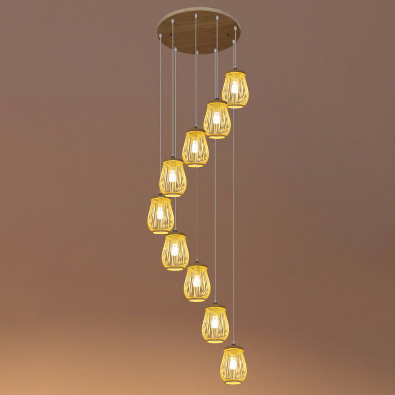 Bamboo Cage Suspension Light Asian Beige Multiple Hanging Pendant Light for Stairway 9 Beige Oval Clearhalo 'Ceiling Lights' 'Modern Pendants' 'Modern' 'Pendant Lights' 'Pendants' Lighting' 2385180