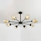Modernist 3/6/8 Lights Hanging Chandelier Black/Chrome Sputnik Suspension Pendant with Blue/Amber Glass Shade Clearhalo 'Ceiling Lights' 'Chandeliers' 'Close To Ceiling Lights' 'Glass shade' 'Glass' 'Modern Chandeliers' 'Modern' Lighting' 238917