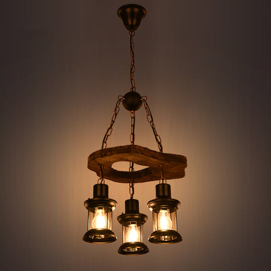 3-Light Clear Glass Chandelier Farm Style Brown Lantern Restaurant Suspension Pendant Light Clearhalo 'Cast Iron' 'Ceiling Lights' 'Chandeliers' 'Industrial Chandeliers' 'Industrial' 'Metal' 'Middle Century Chandeliers' 'Rustic Chandeliers' 'Tiffany' Lighting' 2389238