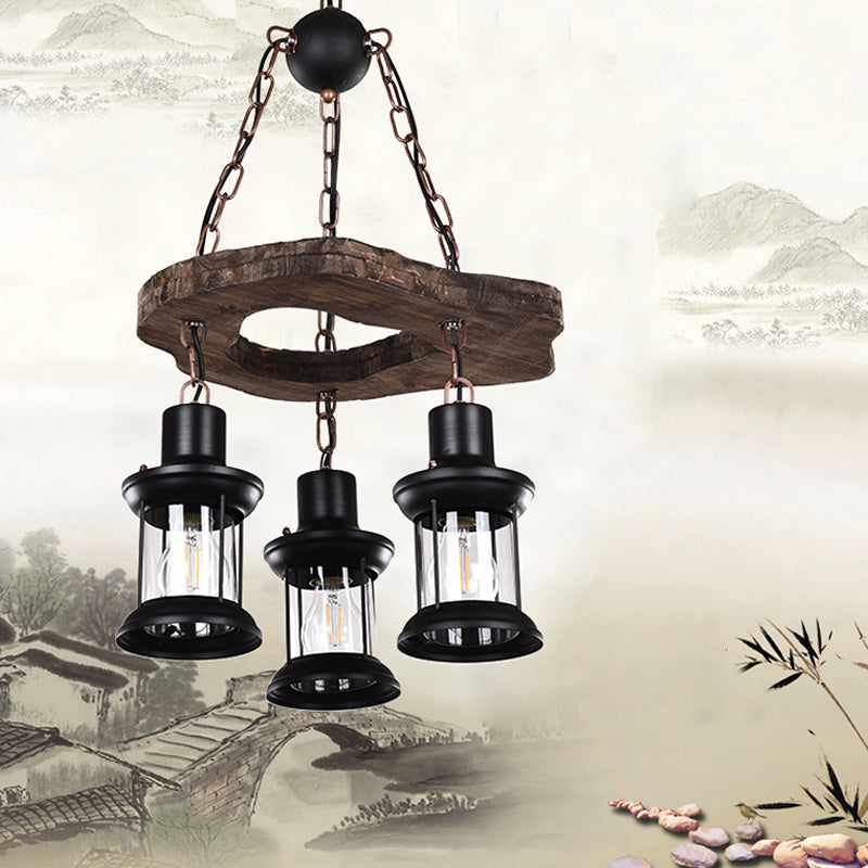 3-Light Clear Glass Chandelier Farm Style Brown Lantern Restaurant Suspension Pendant Light Clearhalo 'Cast Iron' 'Ceiling Lights' 'Chandeliers' 'Industrial Chandeliers' 'Industrial' 'Metal' 'Middle Century Chandeliers' 'Rustic Chandeliers' 'Tiffany' Lighting' 2389239