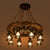 Wooden Wagon Wheel Chandelier Nautical 8-Bulb Dining Room Pendant Light Fixture with Lantern in Brown Brown Clearhalo 'Cast Iron' 'Ceiling Lights' 'Chandeliers' 'Industrial Chandeliers' 'Industrial' 'Metal' 'Middle Century Chandeliers' 'Rustic Chandeliers' 'Tiffany' Lighting' 2389242