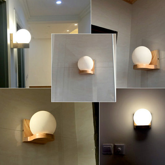 Ball Shaped Foyer Wall Sconce Opal Glass 1-Light Nordic Wall Light Fixture in Wood Clearhalo 'Modern wall lights' 'Modern' 'Wall Lamps & Sconces' 'Wall Lights' Lighting' 2389782