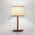 Simplicity Shaded Table Lamp Fabric 1-Light Bedroom Night Light with Wooden Base Brown Barrel Clearhalo 'Lamps' 'Table Lamps' Lighting' 2390301